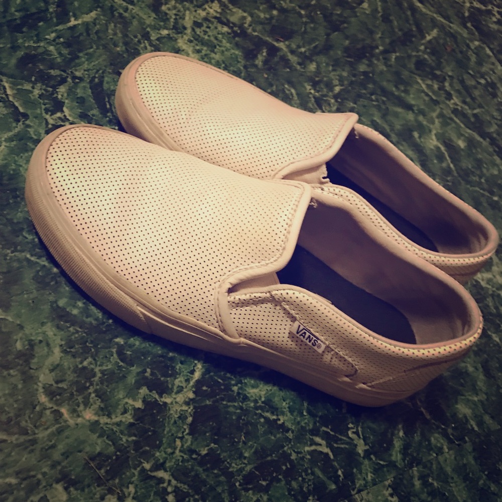 Gently used Women’s Vans all white slip ons.